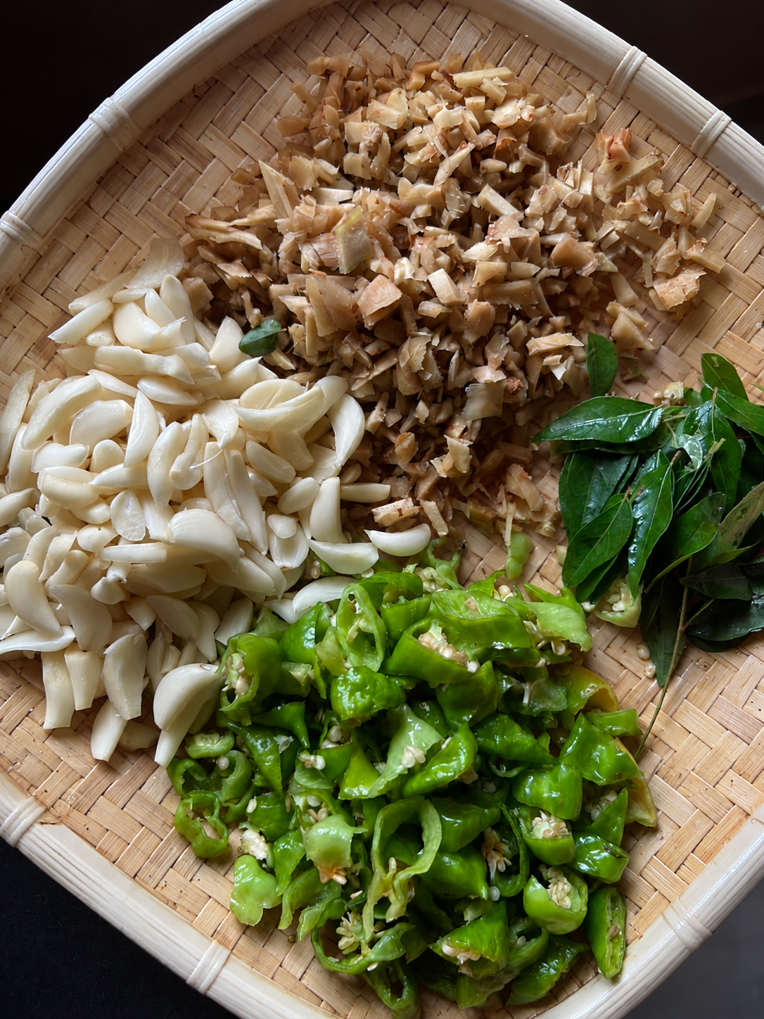 Garlic, ginger, green chilli and curry leaves prepared for TAILS